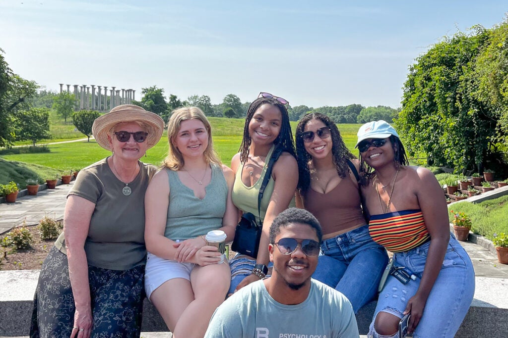 Students pose together at a garden at the National Arboretum.