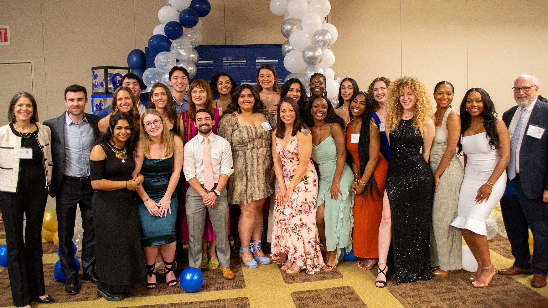Students in the IMHS Class of 2024 pose with Dr. Amri and Dr. Haramati at the IMHS 20th anniversary celebration.